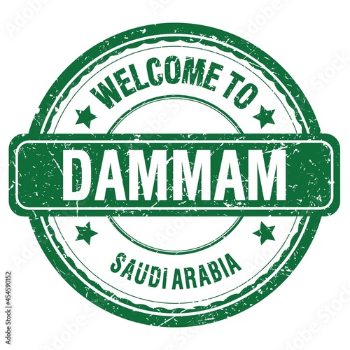 WELCOME TO DAMMAM - SAUDI ARABIA, words written on green stamp photo