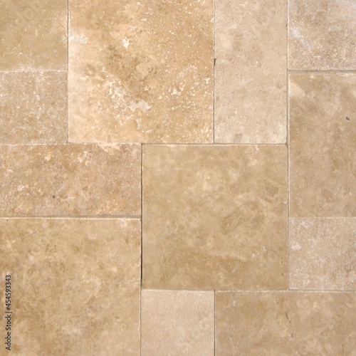 Tumbled travertine paver texture in beige