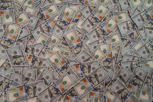 background in the form of untidy dollar bills
