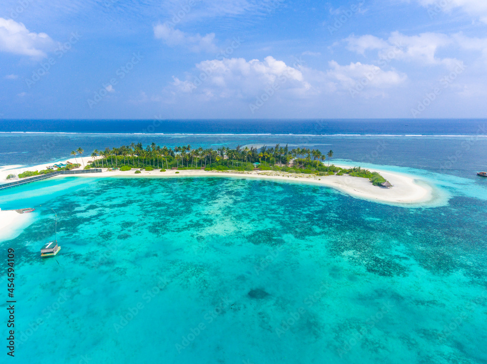 An aerial view on a small islet near Olhuveli island, Maldives