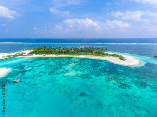 Fototapeta Naklejka Na Ścianę i Meble -  An aerial view on a small islet near Olhuveli island, Maldives