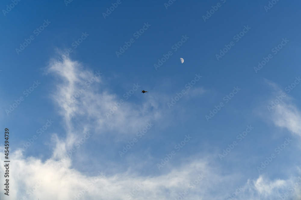Beautiful blue sky with plane flying on distance. Natural background wallpaper. Calmness atmosphere during summer weather. Beautiful blue sky with plane flying on distance. Natural background wallpaper. Calmness atmosphere during summer weather.