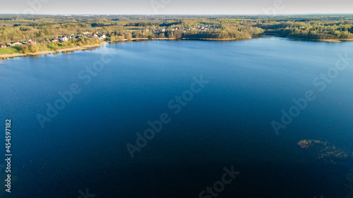 Aerial view of the lake or river with pattern wave. Water surface with ripples texture background. Viewed from above. Environment concept.