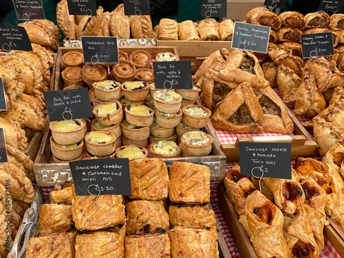 Food - Pies and savory pastries on a market stall in Malton - Yorkshires Food Capital photo