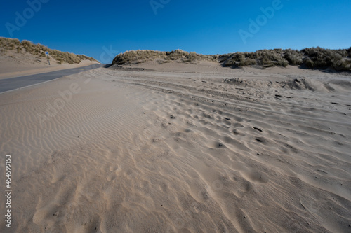 View on wide white sandy North sea beach in Renesse, Zeeland, Netherlands