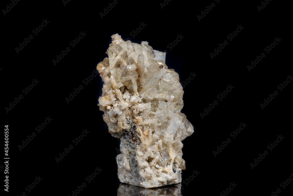Macro mineral stone fluorite with quartz against black background Macro mineral stone fluorite with quartz against black background