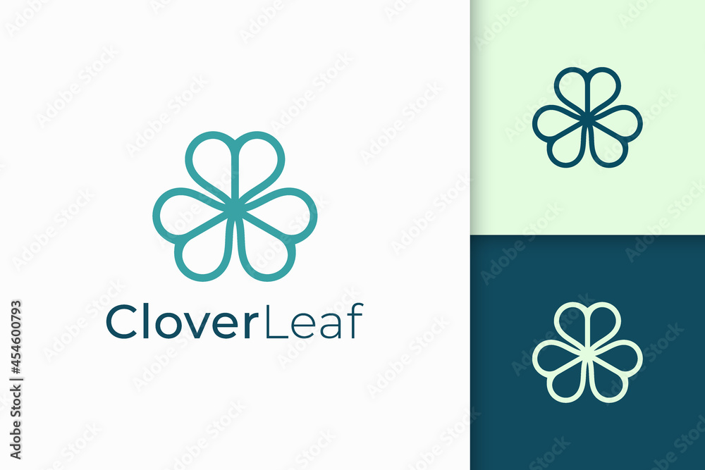 Clover logo in simple line and love shape represent lucky