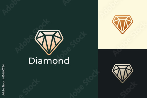 Luxury gem or jewel logo in diamond shape with gold color