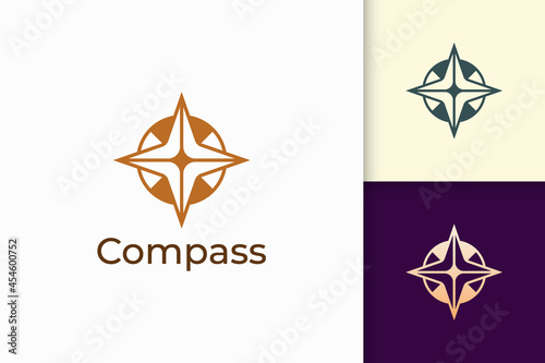 Compass logo in modern shape represent adventure and survival