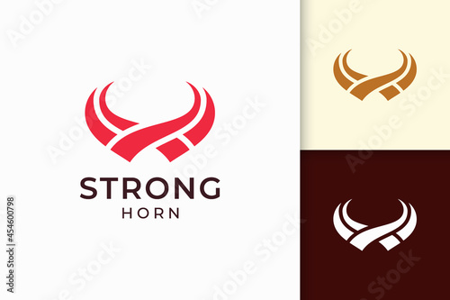 Abstract horn logo in solid red color