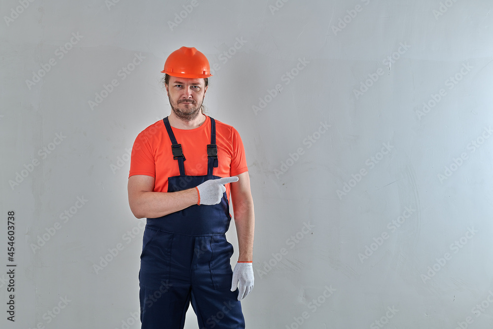 a stern engineer in white gloves raised his hands up a stern engineer in white gloves raised his hands up