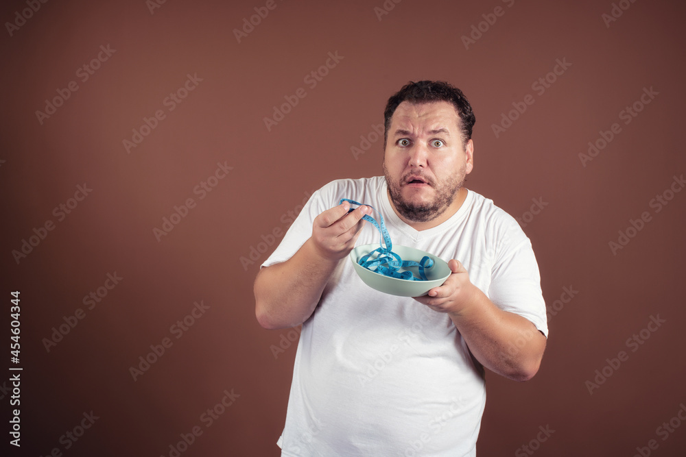 Diet and healthy lifestyle. Funny fat man. Diet and healthy lifestyle. Funny fat man.