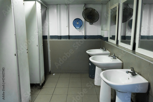 Public toilet room interior. On the cruise ferry
