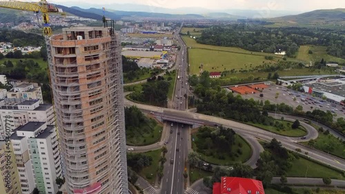 Cluj-Napoca,Cluj/Romania-07.20.2019:West City Tower Cluj-Napoca,the tallest building in Cluj county, is built in Manastur,at the exit to Floresti. It will have 25 floors,182 apartments,95 meters  photo