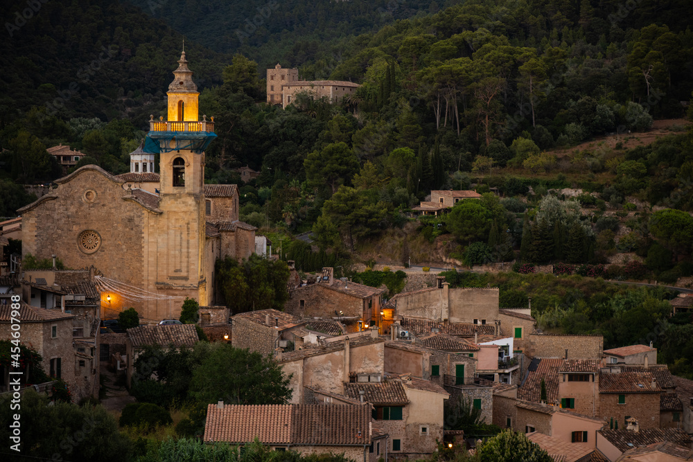 view of a churching Valldemossa Spain, Mallorca during sunset with its historical building became a world heritage place 