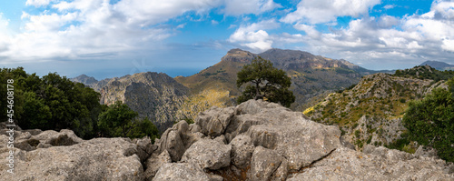 Landscape of the Island of Mallorca, Baleares, Spain, high in the mountain, hiking with a stunning view at the mediterranen sea fro the Tramontana Mountains 