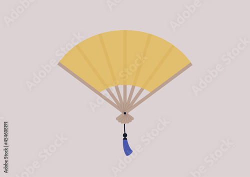 A traditional open gold fan, personal accessories