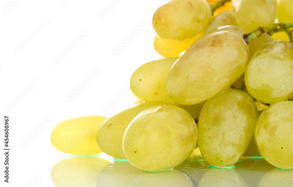 One bunch of organic juicy green grapes, close-up, isolated on white. One bunch of organic juicy green grapes, close-up, isolated on white.