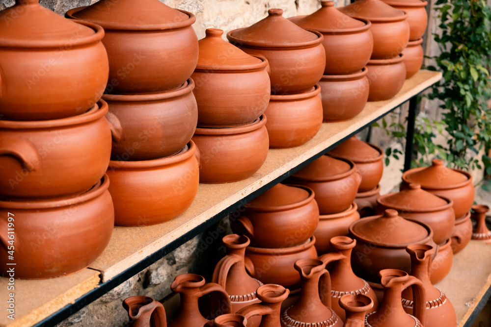 Handmade clay pots. These pots are mostly used in Asian cooking or sold as souvenirs. Handmade clay pots. These pots are mostly used in Asian cooking or sold as souvenirs.