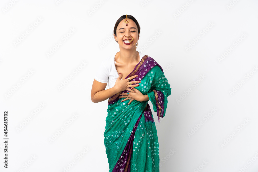 Young indian woman isolated on white background smiling a lot Young indian woman isolated on white background smiling a lot