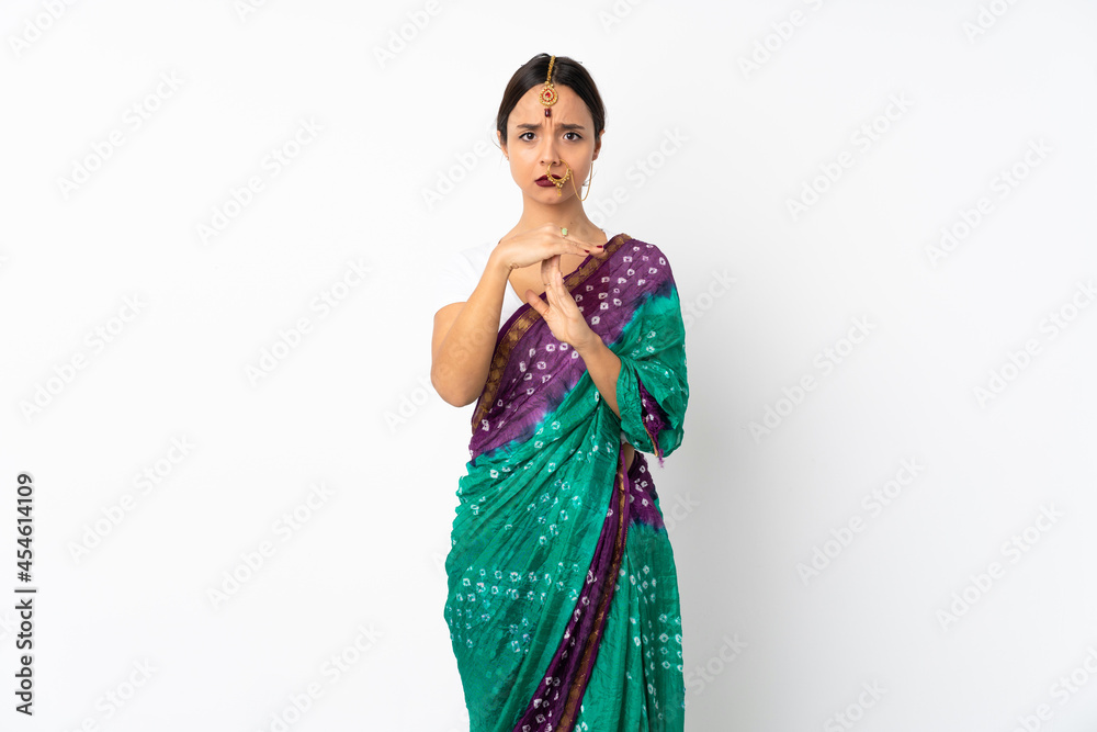 Young indian woman isolated on white background making time out gesture Young indian woman isolated on white background making time out gesture