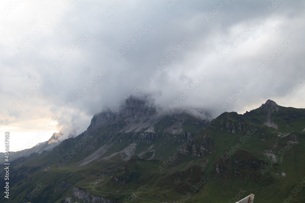 Amazing Landscape in the hearth of Switzerland. Epic scenery with the clouds and fog. Wonderful sunrays through the clouds and later an amazing sunset and sunrise. Perfect roadtrip through Switzerland