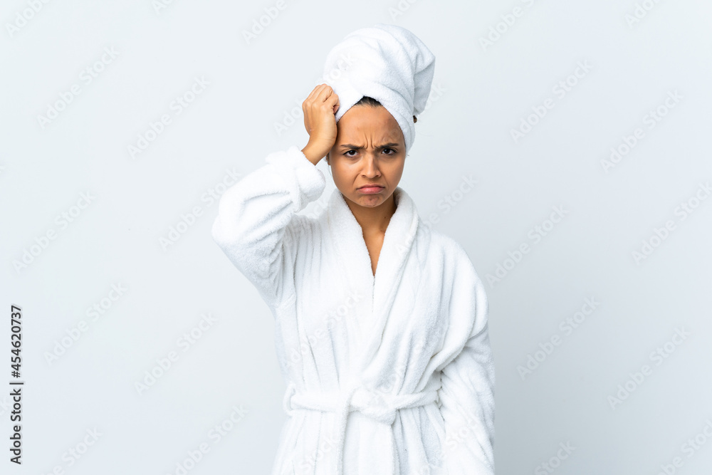 Young woman in bathrobe over isolated white background with an expression of frustration and not understanding Young woman in bathrobe over isolated white background with an expression of frustration and not understanding