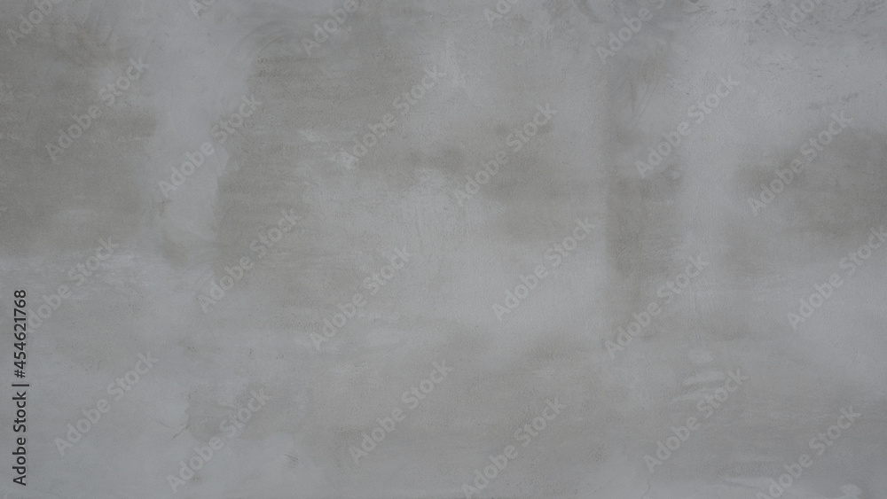 Image of gray plaster on concrete wall.