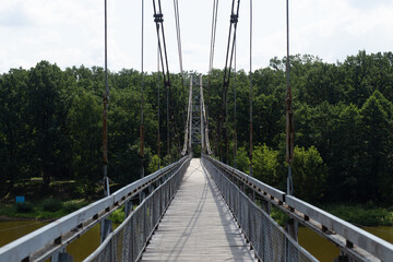 Pedestrian suspension bridge over river Neman