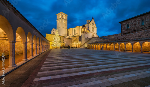 Christmas in Assisi, Saint Francis Basilica with the Christmas Tree illuminated in the evening. Province of Perugia, Umbria, Italy.