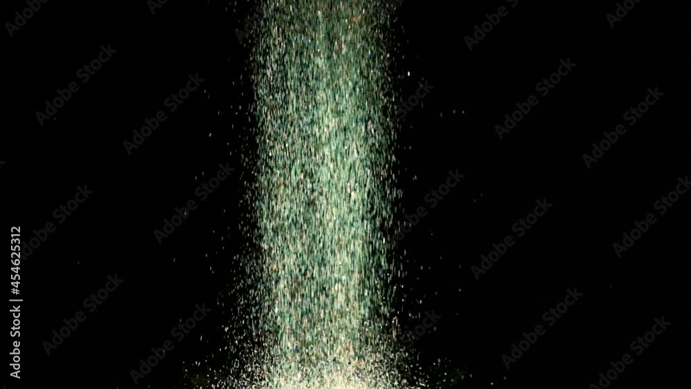 The shiny particles flying in the air. slow motion The shiny particles flying in the air. slow motion
