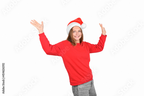Portrait of crazy cool cheerful positive optimistic pretty woman in casual red sweater and santa hat isolated on white background. Christmas emotion: joy, surprised, christmas sale banner