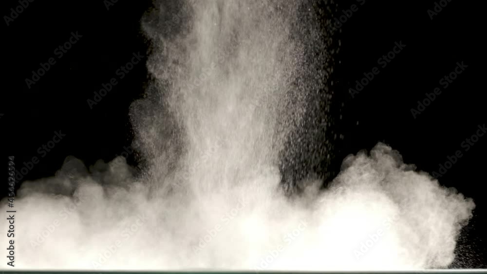 The explosive wave of shiny particles. slow motion