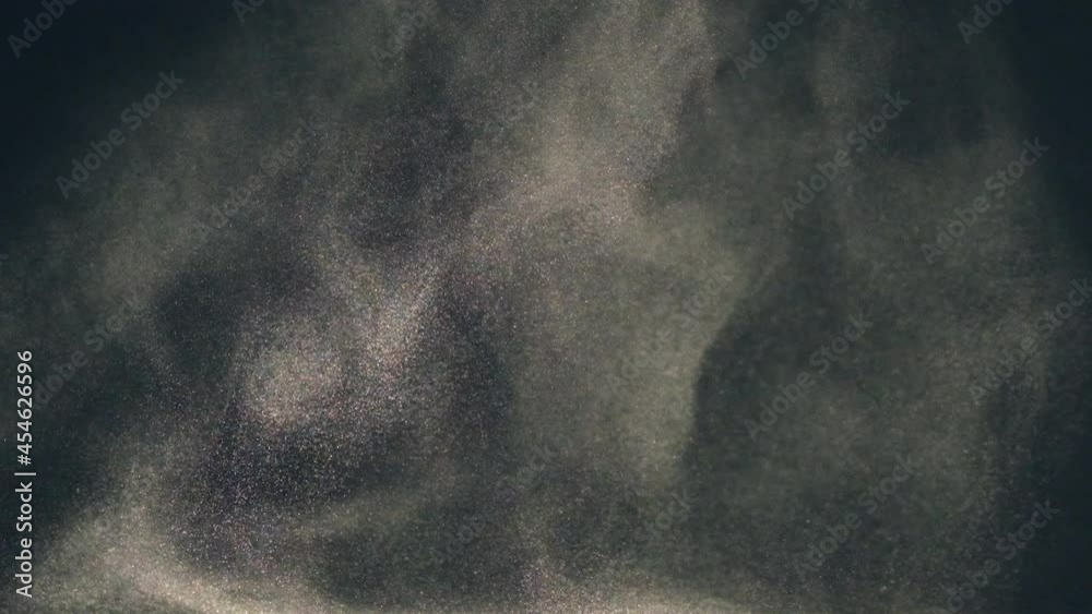 The sparkling particles flying in the air. slow motion