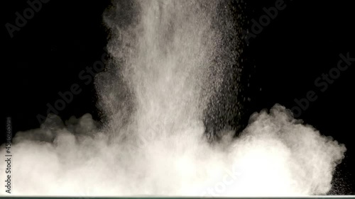 The explosive wave of shiny particles. slow motion