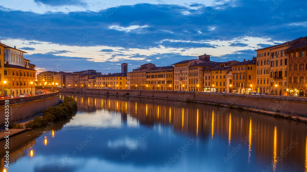 City of Pisa and Arno river at dusk