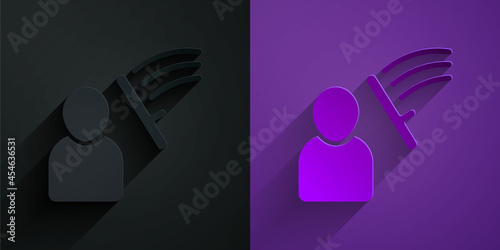 Paper cut Police beat human icon isolated on black on purple background. Abuse of authority. Protests, demonstrations and rallies. Police against protesters. Paper art style. Vector