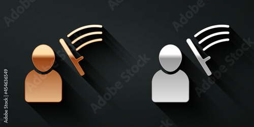 Gold and silver Police beat human icon isolated on black background. Abuse of authority. Protests, demonstrations and rallies. Police against protesters. Long shadow style. Vector