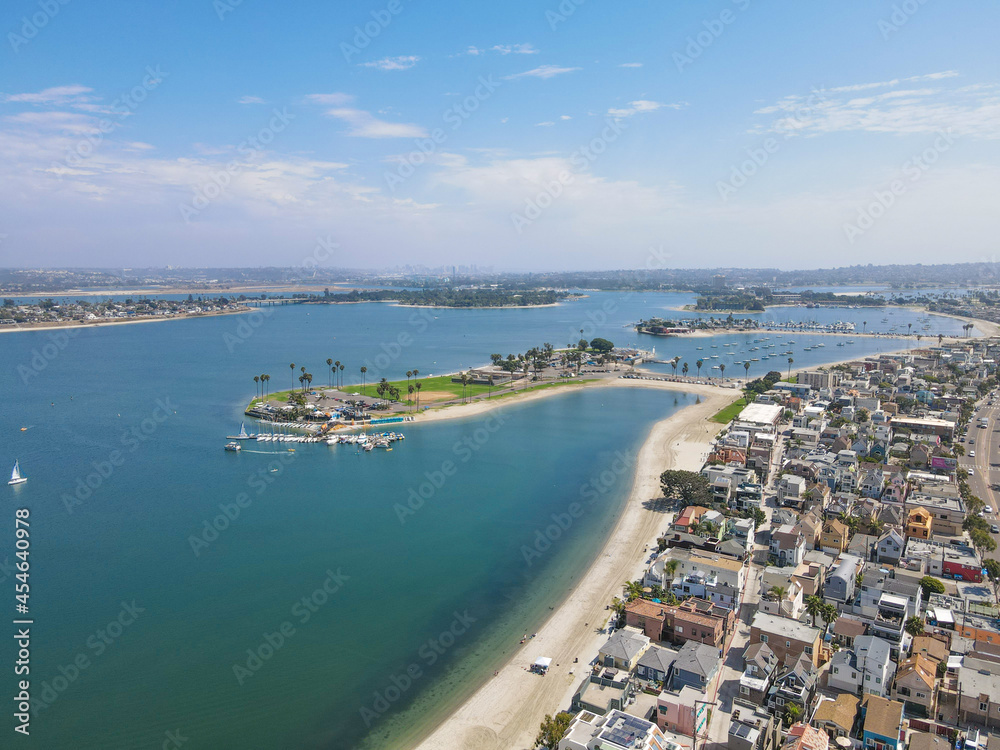 Aerial view of Mission Bay and beach in San Diego during summer, California. USA. Community built on a sandbar with villas, sea port and recreational Mission Bay Park.