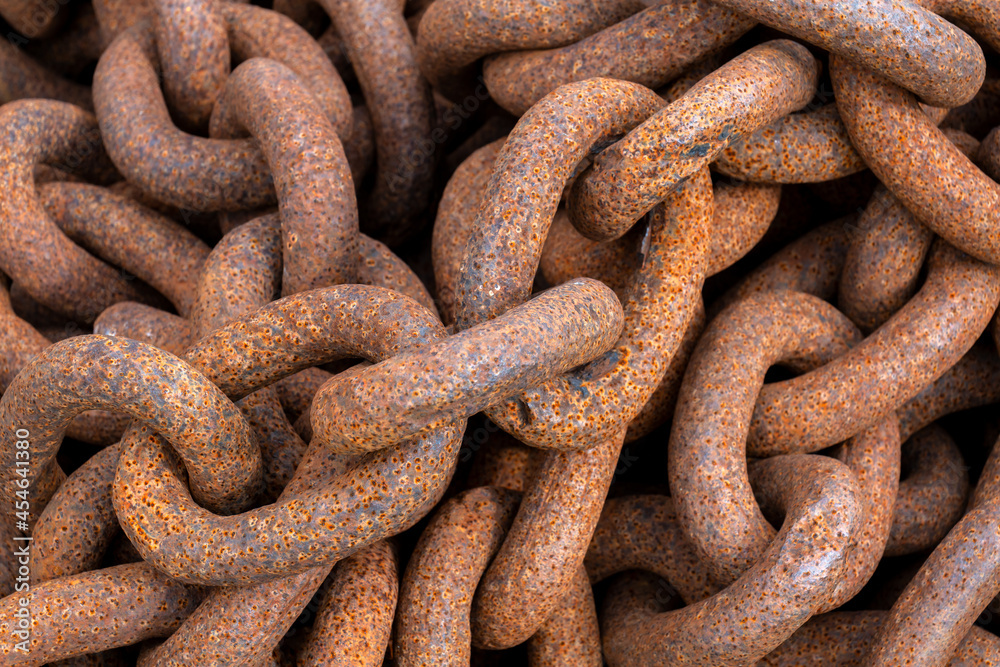 Close-up of rusty chain. Closeup of a bunch of rusty chains. Overhead shot of rusty metal chains in a bunch Close-up of rusty chain. Closeup of a bunch of rusty chains. Overhead shot of rusty metal chains in a bunch