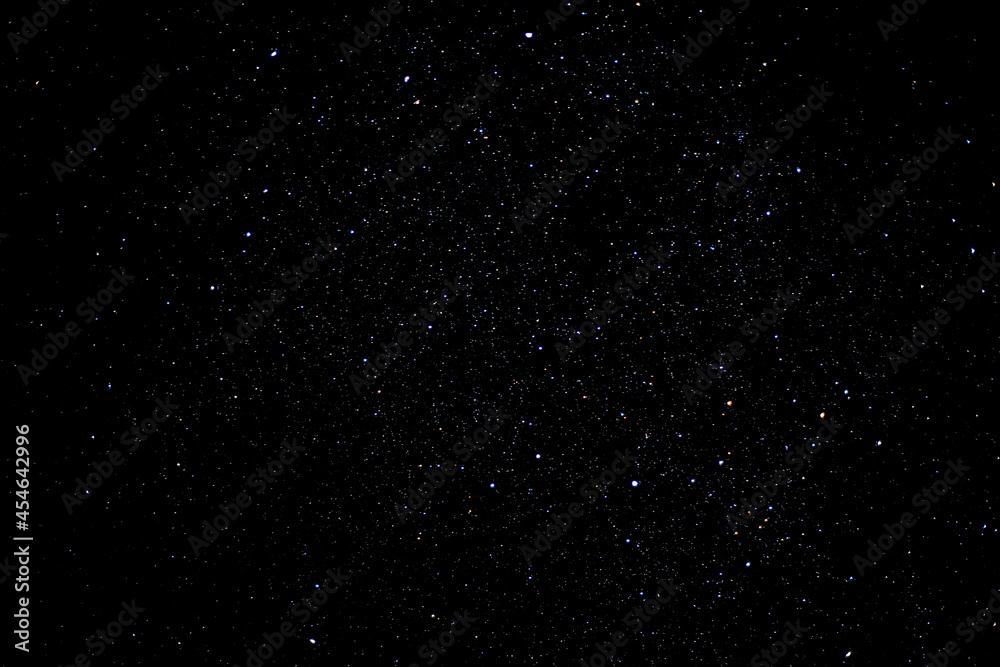 Starry sky background with bright stars in dark night sky
