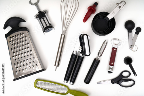 Photograph of a kitchen drawer filled with an assortment of kitchen utensils