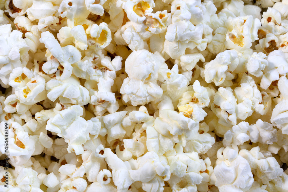 Popcorn, salted - background or texture. Popcorn, salted - background or texture.