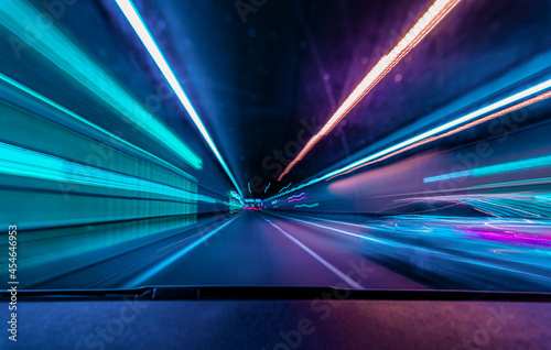 Highspeed underground drive - colorful concept for racing though the night and overtake another car in a tunnel with motion blur effect.