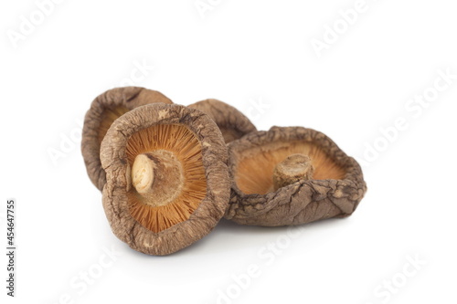 Dried shiitake mushrooms isolated on white.