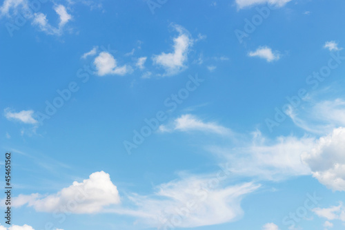 White clouds on blue sky close-up, natural background.