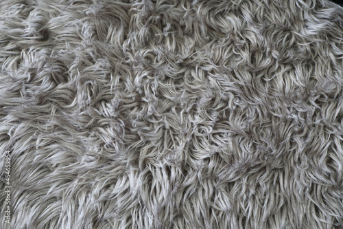 Closeup detail of thick gray shag carpet photo