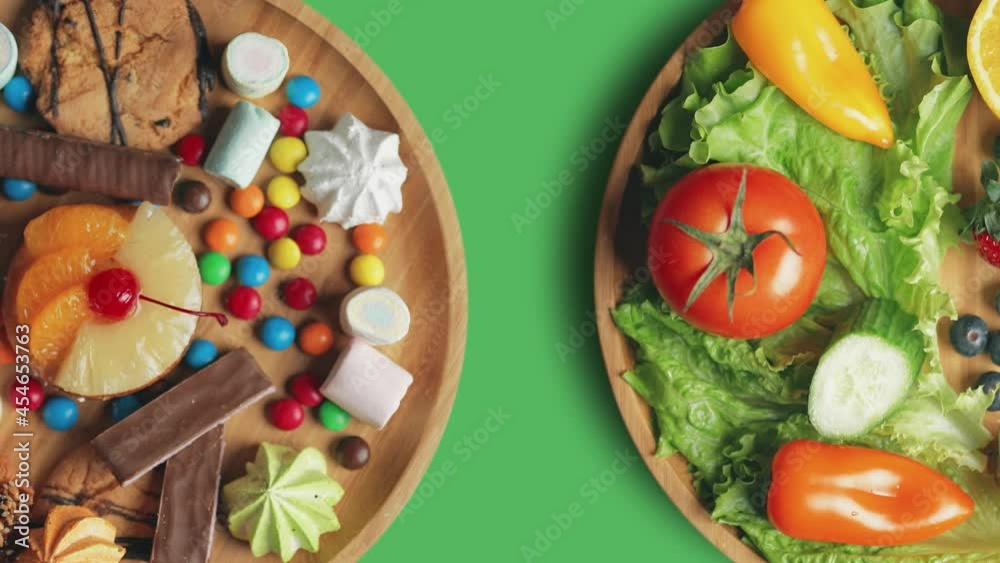 Fruits and vegetables vs candy sweets and unhealthy food. Top view