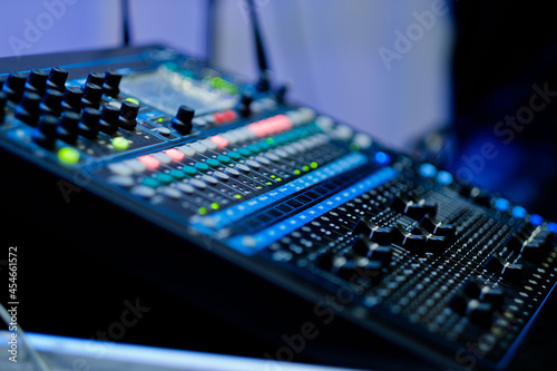 sound check for concert, mixer control, music engineer, backstage 
