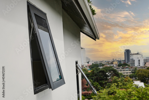 Black frame aluminium windows of building.